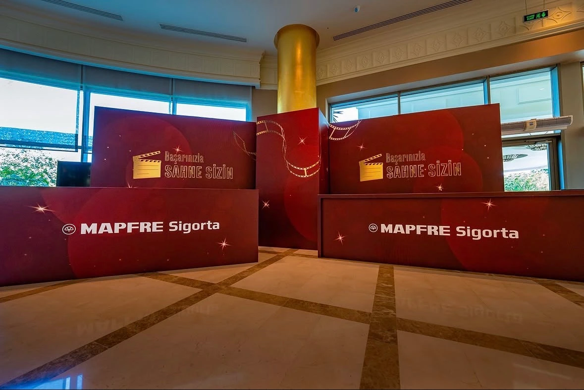 Branded MAPFRE Sigorta welcome and registration desks for guest arrival at the Antalya corporate event