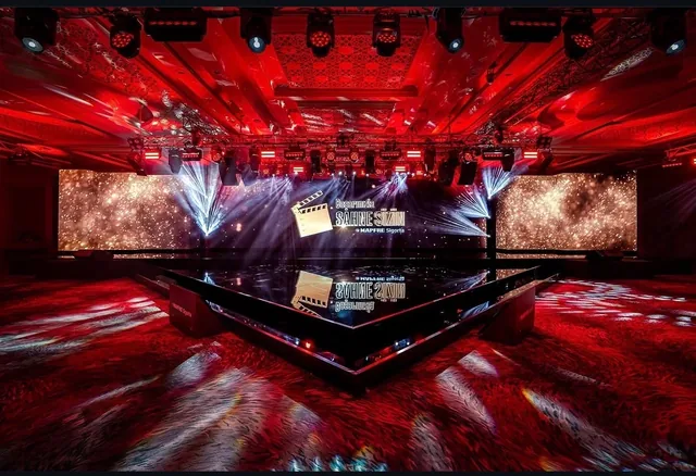 MAPFRE Sigorta corporate event stage in Antalya with LED screens and red stage lighting