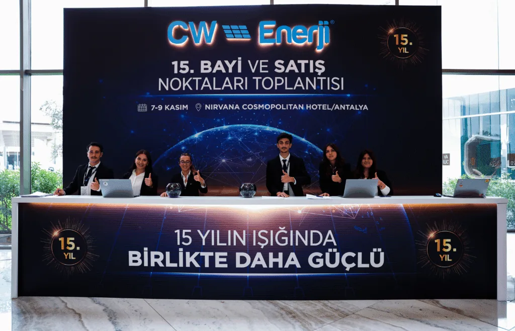 Branded registration desk with staff for the CW Enerji 15th dealer and sales meeting at Nirvana Cosmopolitan, Antalya
