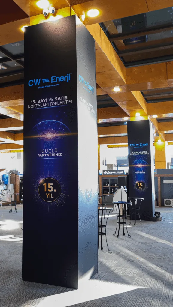 Tall branded column wrap for the CW Enerji 15th dealer meeting in Antalya
