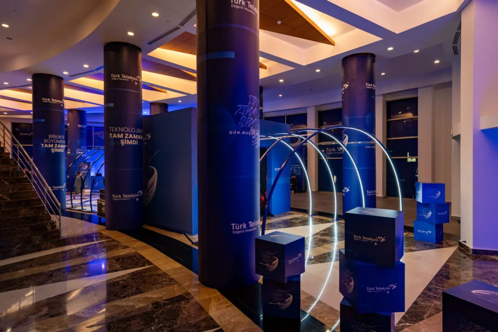 LED arch walkway with branded column wraps and display cubes at the Türk Telekom Business Partners Meeting, Rixos Sungate, Antalya