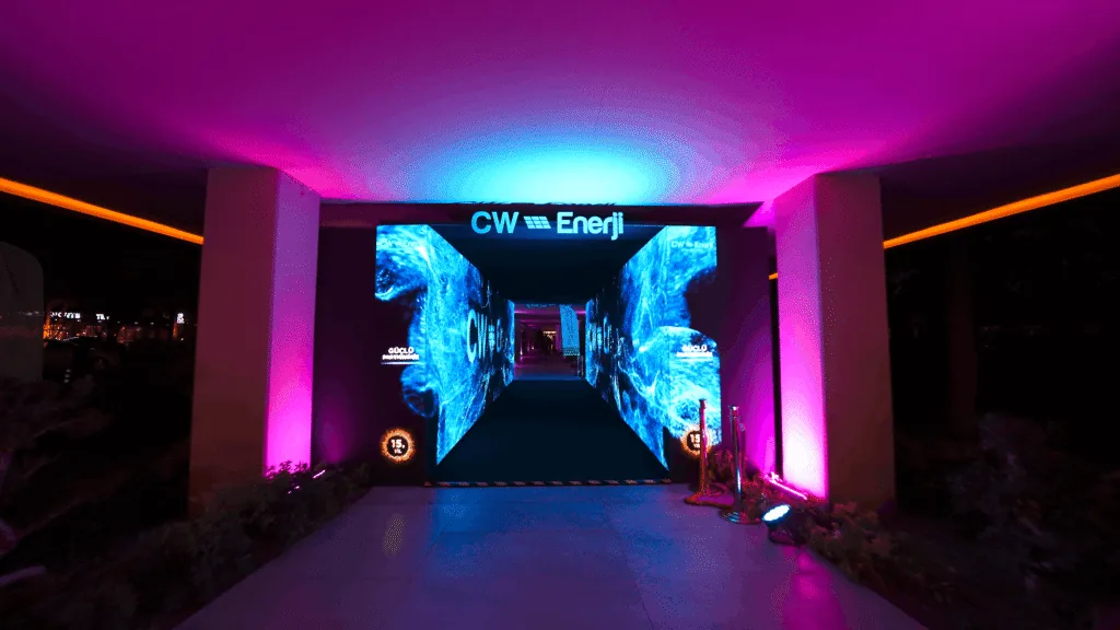 LED screen tunnel entrance with pink and blue lighting for the CW Enerji dealer meeting in Antalya