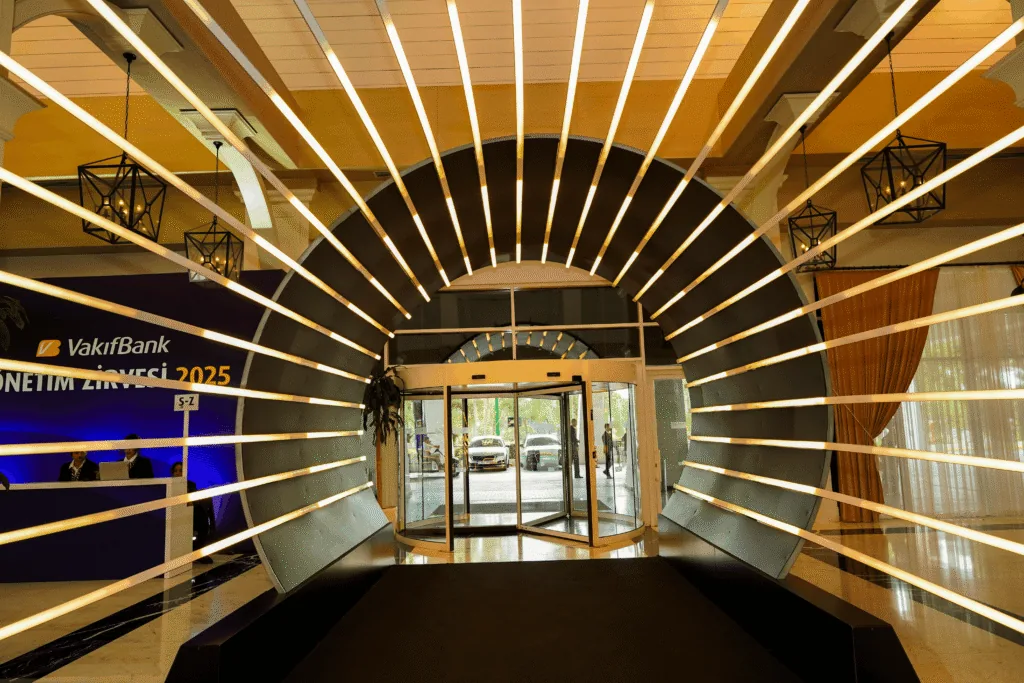 Radial light tunnel framing a hotel entrance for the VakıfBank Management Summit 2025 at Titanic Deluxe Golf Belek, Antalya