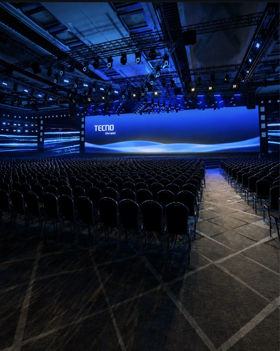 Plenary hall set-up for a partner session at the Türk Telekom Business Partners Meeting: full-width LED stage, lighting rig and theatre seating